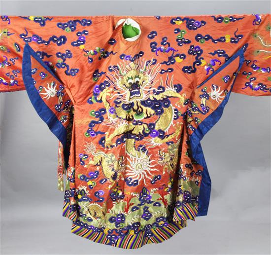 A Chinese embroidered silk and metal thread dragon theatrical robe, early 20th century, length 121cm